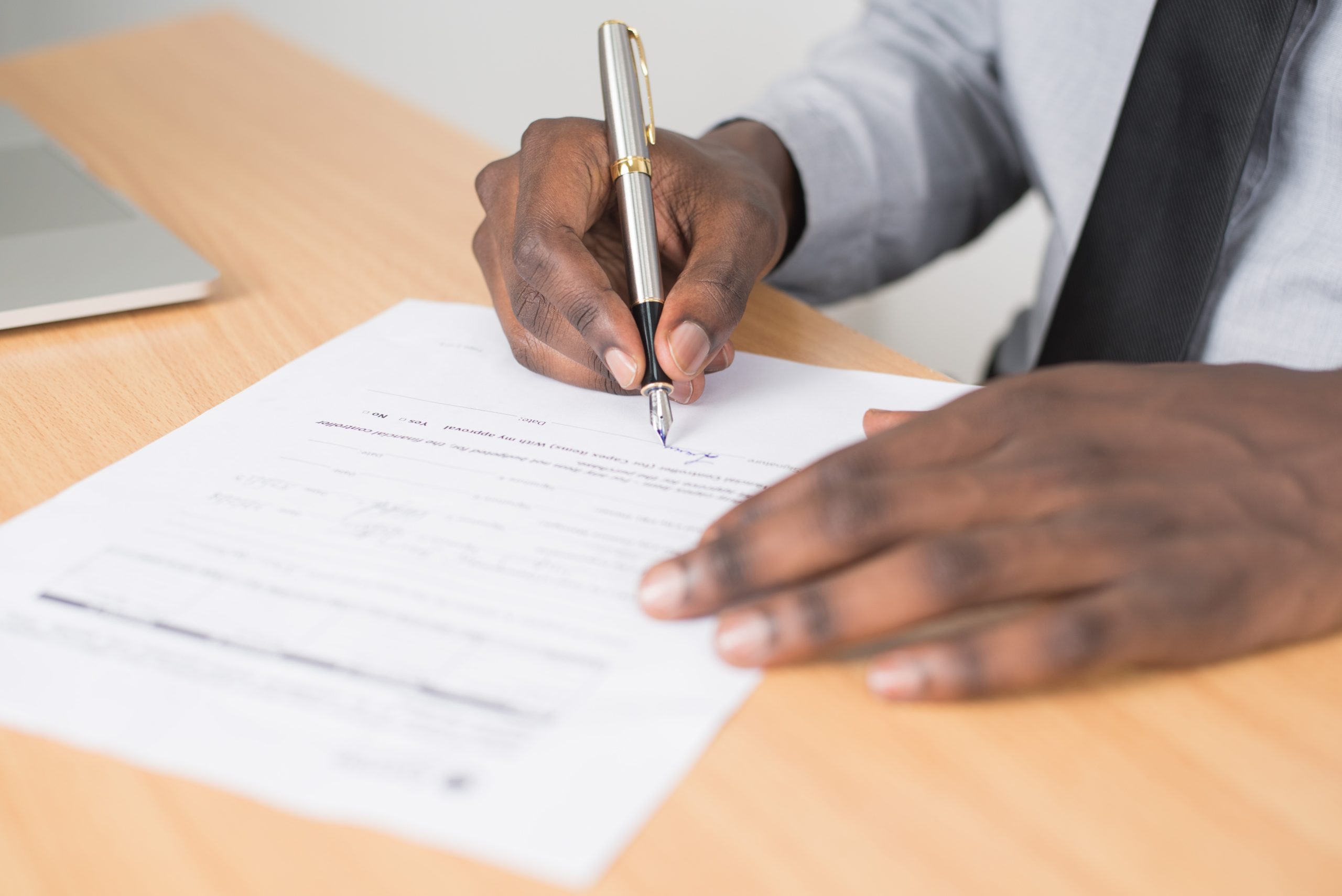man filling in form